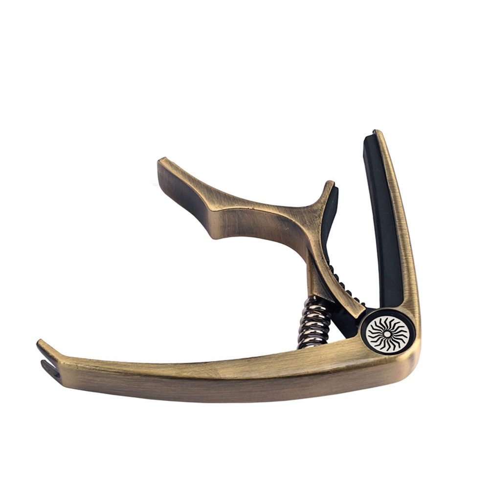 Guitar Capo Clip-on Tuner Gun- - огляд і ціна Guitar Tuner Clip